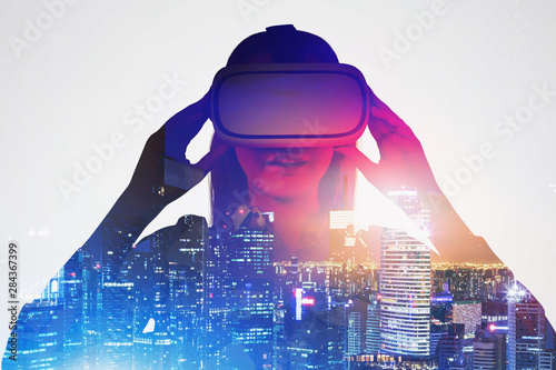 Astonished woman in VR glas...