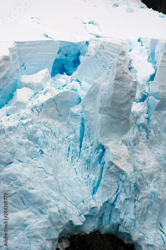 Antarctica. Lemaire Channel. Glacier with crevasses.