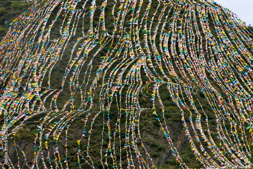 Praying flags covered the hillside, Ganbao Tibetan Village, Ngawa Tibetan and Qiang Autonomous Prefecture, western Sichuan, China photo