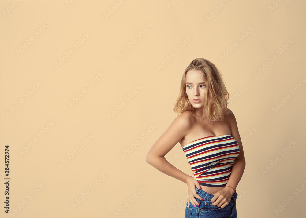 young cute and adorable girl on empty background, blond hair, empty for description, close up studio shot, passionate look young cute and adorable girl on empty background, blond hair, empty for description, close up studio shot, passionate look