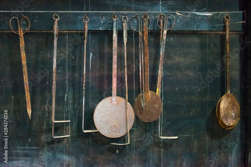 Tools in an old house, Zhuokeji Headman's Village, Ngawa Tibetan and Qiang Autonomous Prefecture, western Sichuan, China photo