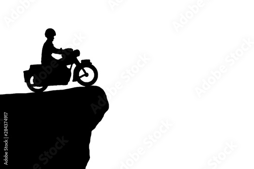 Selective focus silhouette miniature riding the motorcycle stand by top of cliff isolated on white background.  Sport and extreme sports concept.