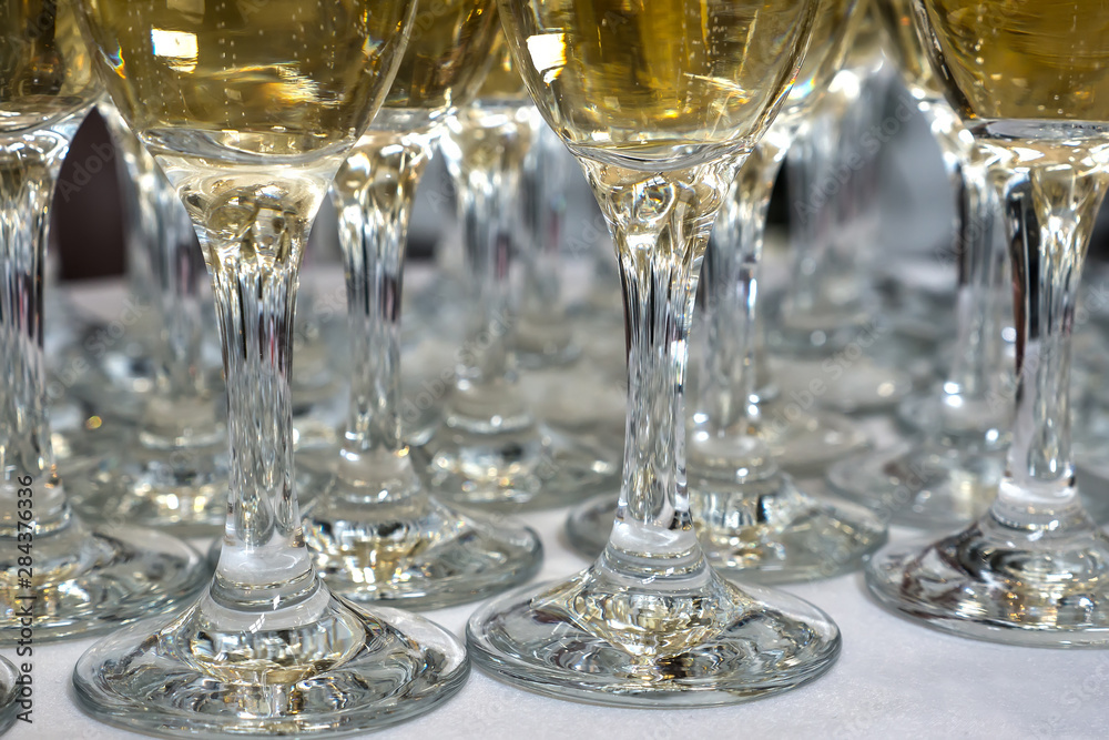 Legs of glasses filled with champagne Legs of glasses filled with champagne