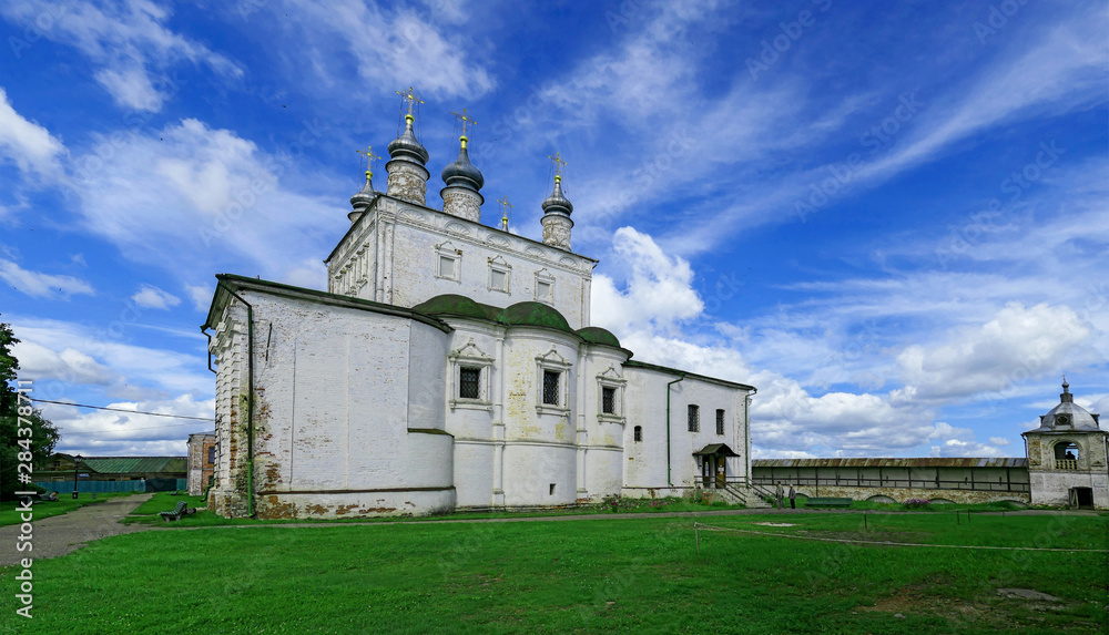 Orthodox monastery under blue cloudy sky in summer