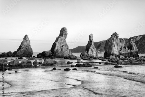 Asia, Japan, Kushimoto. View of Hashigui-iwa Rocks on ocean shore.  photo