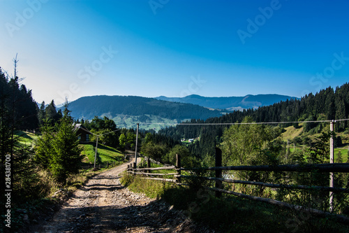 Fence and road at countryside in Carpathian