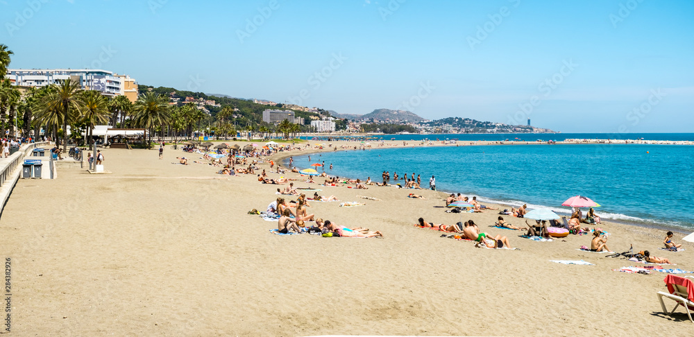people at the beach, Malaga, Spain