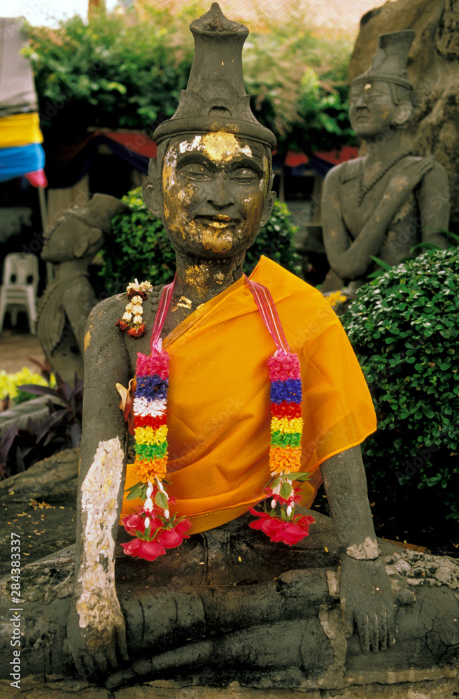 Asia, Thailand, Bangkok. Wat Po, Pishis decorated with flowers.