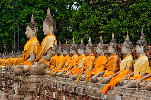 Row of Buddha statues, Wat Yai Chaya Mongkol or The Great Temple of Auspicious Victory, Ayutthaya, Thailand