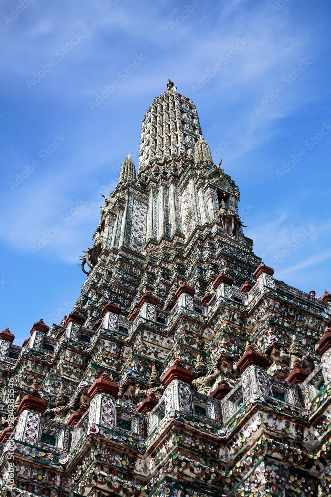 Bangkok, Thailand. Wat Arun, Temple of Dawn, demons help support the massive temple prang structure