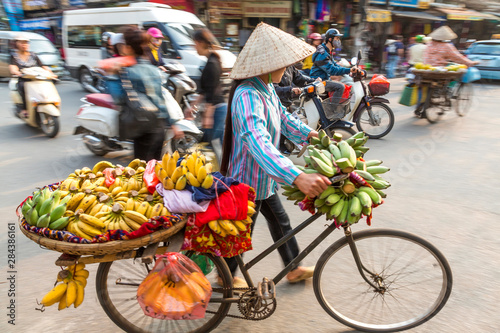 Fruit seller with bicycle, Hanoi, Vietnam