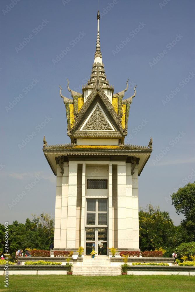 Naklejka premium Cambodia. Phnom Penh. Choeung Ek the Killing Fields memorial. Ossuary filled with skulls of those killed by the Khmer Rouge.