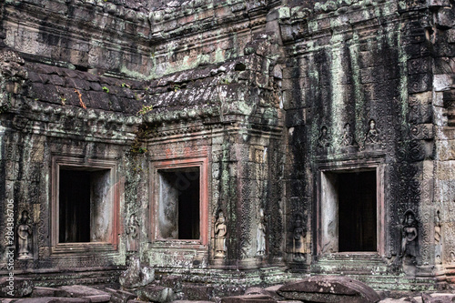 Siem Reap  Cambodia. Ancient ruins and windows of the Bayon Temple in Preah Khan