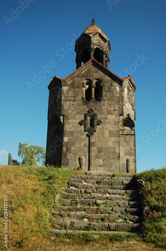 Armenia, Haghpat, view of a catholic church built with stones and a tiled roof, with a stone staircase in the foreground photo