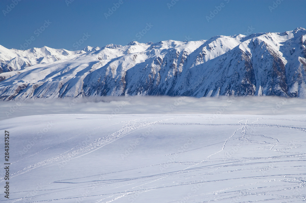 The Roundhill Ski Area with fog covered Lake Tekapo and the Hall Range, Mackenzie Country, South Island, New Zealand