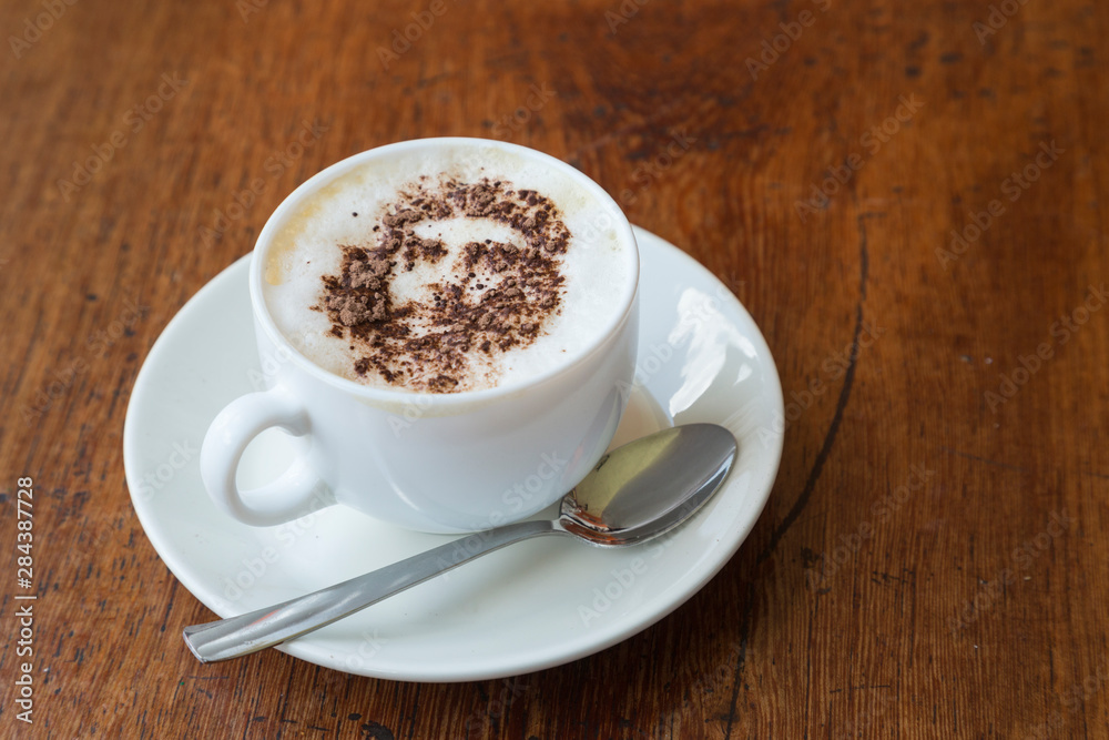 Cuba. Che Guevara is stenciled in cinnamon atop a cup of cappuccino. Cuba. Che Guevara is stenciled in cinnamon atop a cup of cappuccino.
