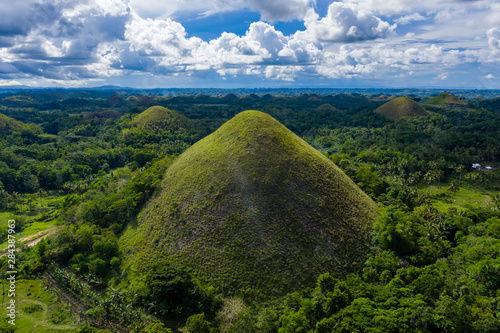 Aerial drone view of the unique scenery of the Chocolate Hills landscape in Bohol, Philippines