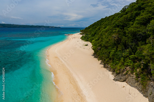 Aerial drone view of the beauiful sandy  tropical beach of Pukka Shell on Boracay Island  Philippines