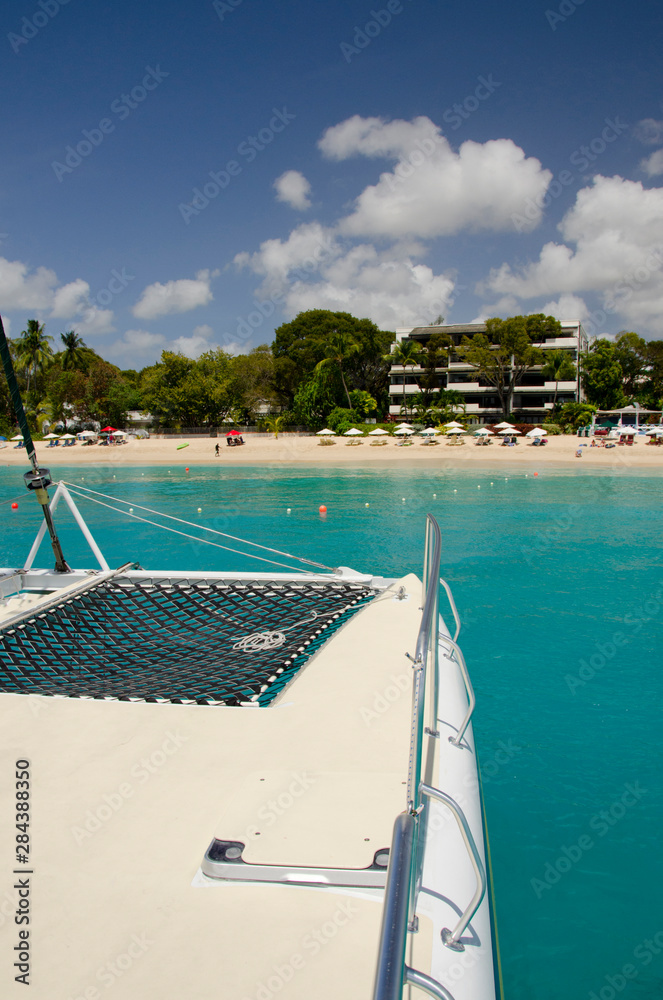 Caribbean, West Indies, Windward Islands, Barbados, Payne's Bay. Sailboat view of Payne's Bay and beach.