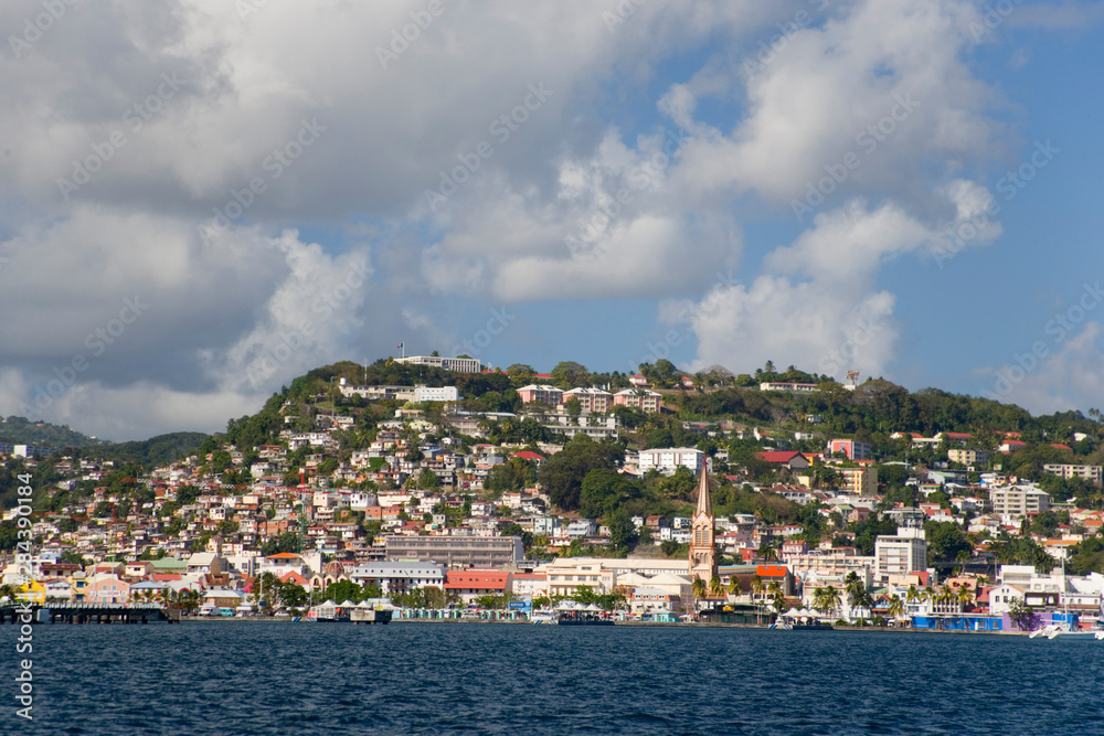 MARTINIQUE. French Antilles. West Indies. City of Fort-de-France below cumulus clouds.