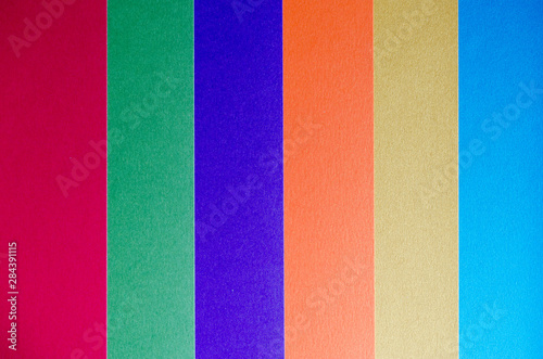 Colored paper texture background. Paper stripes.