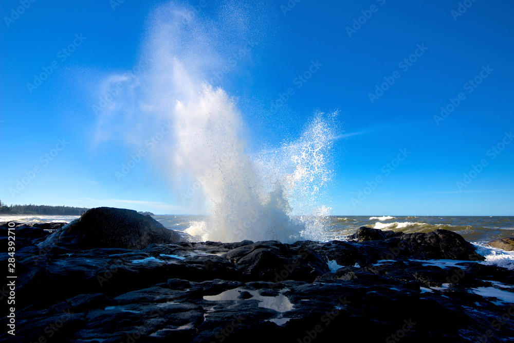 Haida Gwaii, British Columbia. The popular Blow Hole at the base of Tow Hill in Naikoon Provincial Park is a catapult surge of seawater forced through channels.