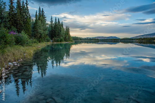 Canada, British Columbia, Boya Lake Provincial Park. Shoreline reflection