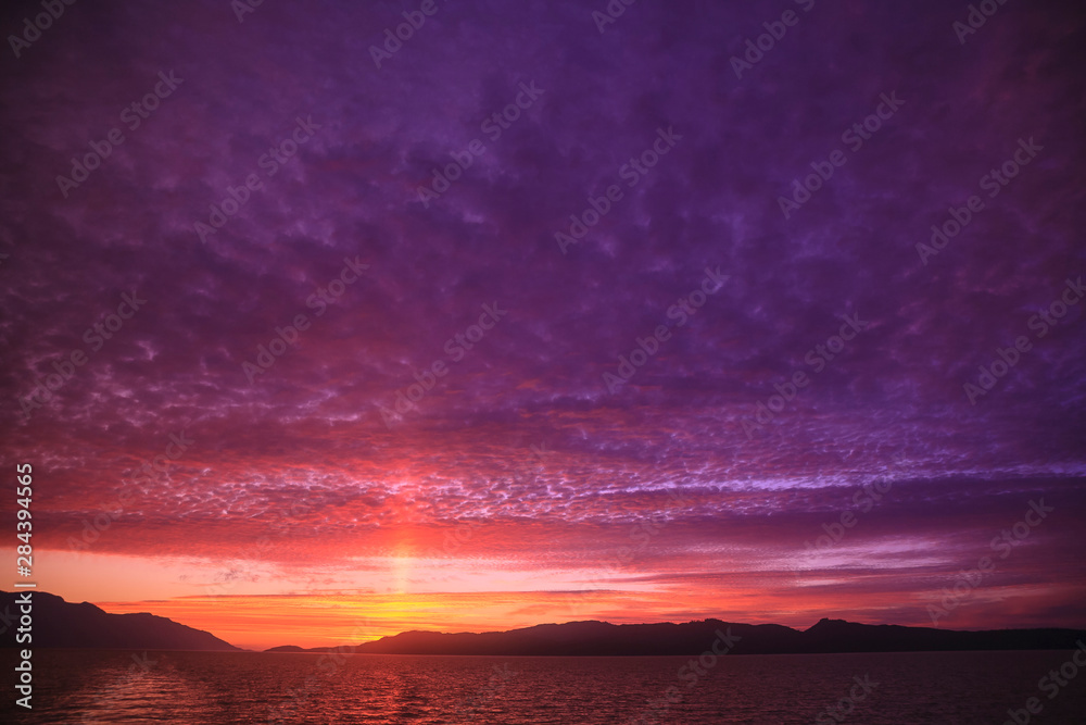 Vibrant summer sunset, Inside Passage North of Campbell River, Vancouver Island, Northern British Columbia, Canada Vibrant summer sunset, Inside Passage North of Campbell River, Vancouver Island, Northern British Columbia, Canada