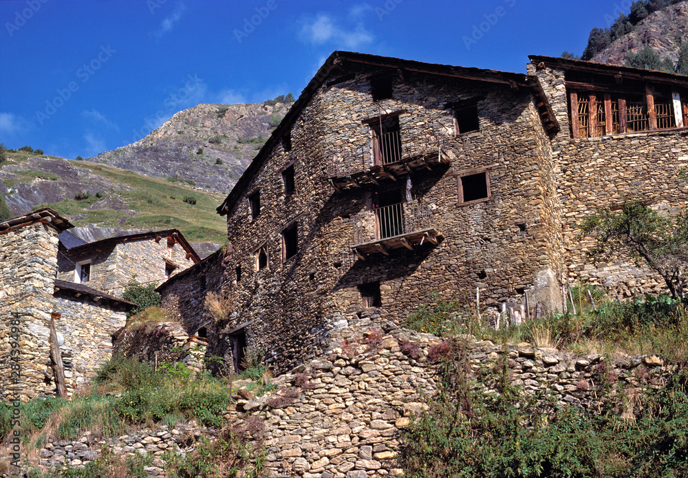 Andorra. Crumbling stone walls dot the hillsides in Andorra. Andorra. Crumbling stone walls dot the hillsides in Andorra.