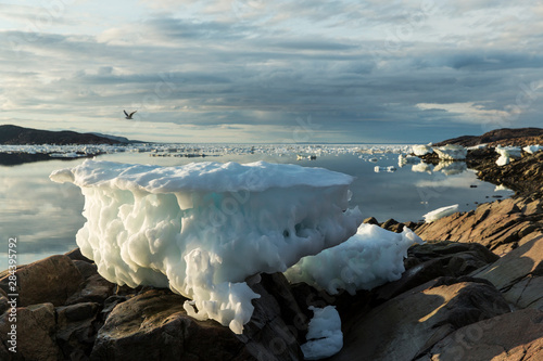 Canada  Nunavut Territory  Melting iceberg stranded by low tide along Frozen Channel at northern edge of Hudson Bay near Arctic Circle