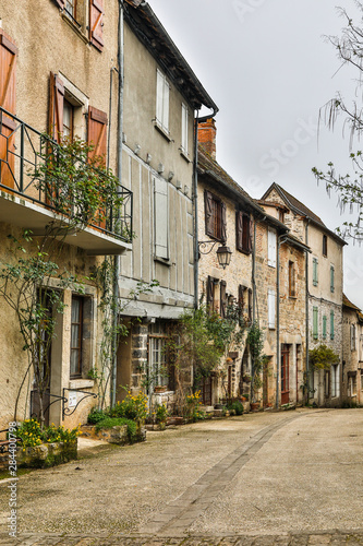 Fototapeta Naklejka Na Ścianę i Meble -  France, Cajarc. Street of homes in the city