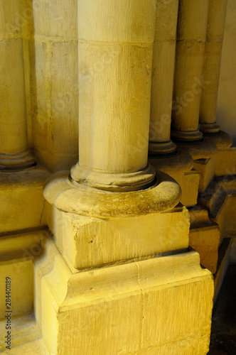 France, Burgundy, Nievre, Nevers. Stone column in yellow light, Nevers Cathedral (Cathedrale Saint-Cyr-et-Sainte-Julitte de Nevers)