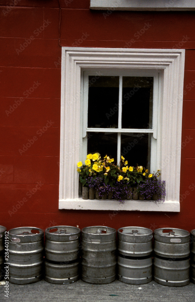 Ireland, Wexlford. Kegs in front of window. Ireland, Wexlford. Kegs in front of window.