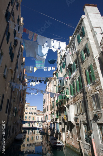 Italy, Venice. Laundry strung between buildings in the Ghetto.