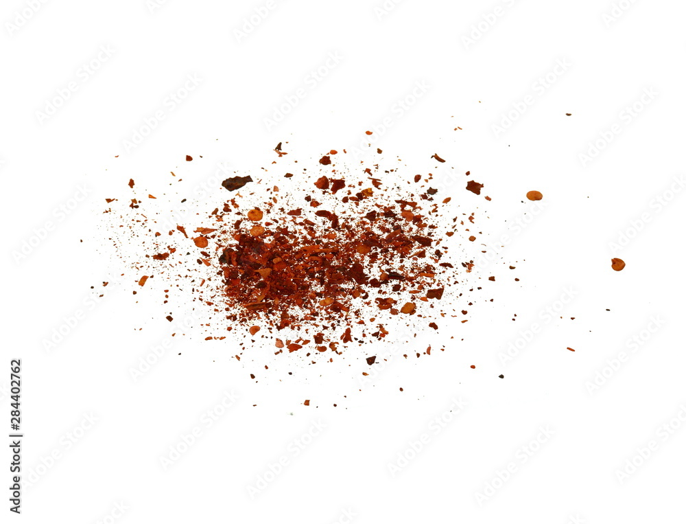 Cayenne pepper. Pile crushed red cayenne pepper, dried chili flakes and seeds isolated on white background