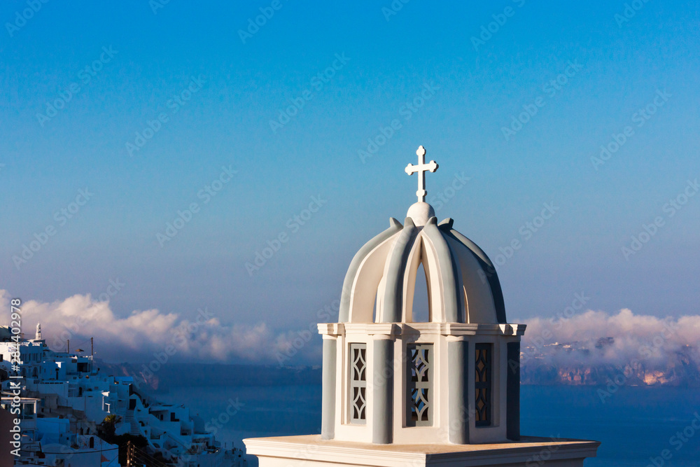 Church on the coast of Aegean Sea. Oia, Santorini Island, Greece.