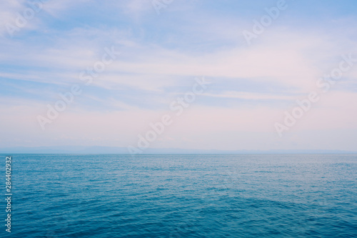 Blue sea and blue sky minimalistic background.
