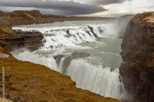 Iceland, Gulfoss. Tourists view multiple waterfalls. Credit as: Cathy & Gordon Illg / Jaynes Gallery / DanitaDelimont.com