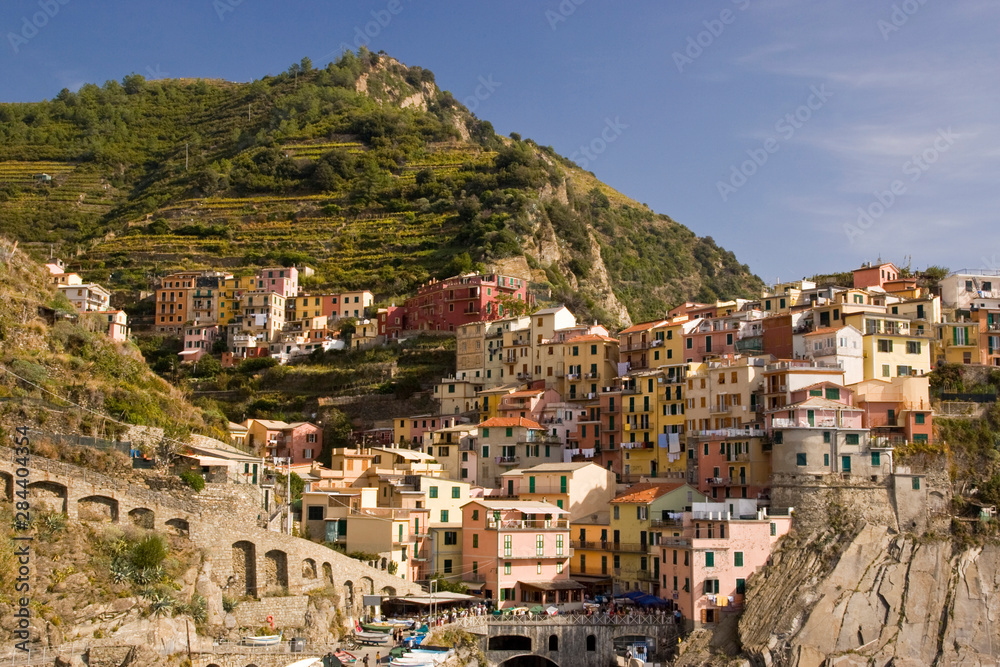 Italy, Cinque Terre, Manarola. View of the town and terraced vineyards.