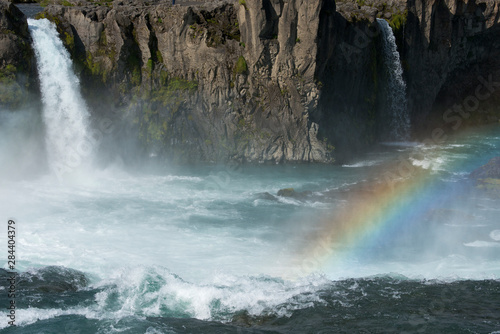 Iceland, Myvatn District off the Ring Road, Northeast Region. Skjalfandafljot River, Godafoss waterfall with rainbow, the most popular waterfall in Iceland.