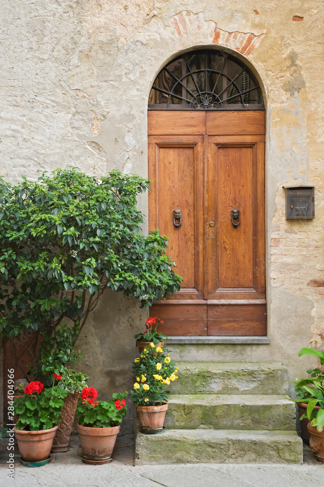 Italy, Tuscany, Pienza. Close-up of doorway to a residence. 