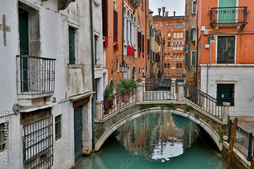 Canal and Bridges with boats Venice Italy