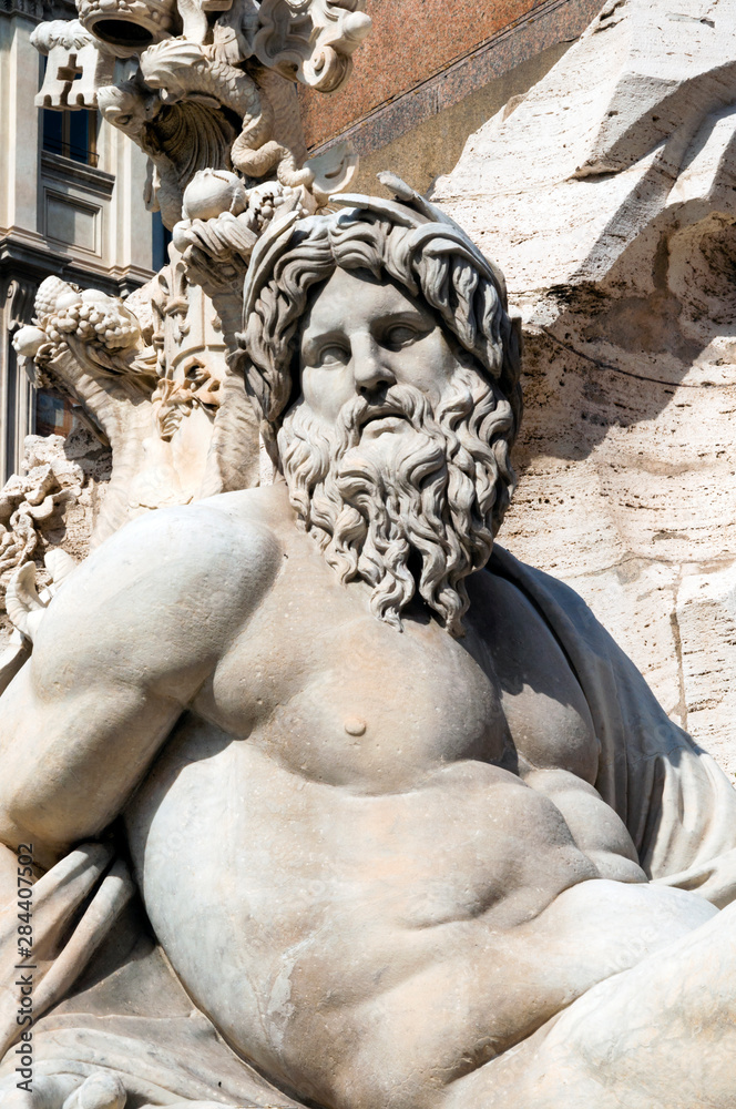 Fontana dei Quattro Fiumi, Detail of River-god Ganges, Piazza Navona, Rome, Unesco World Heritage Site, Latium, Italy, Europe Fontana dei Quattro Fiumi, Detail of River-god Ganges, Piazza Navona, Rome, Unesco World Heritage Site, Latium, Italy, Europe