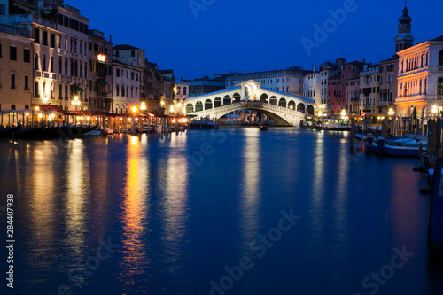 Grand Canal with View of Rialto Bridge with Evening Blue light and Lights.