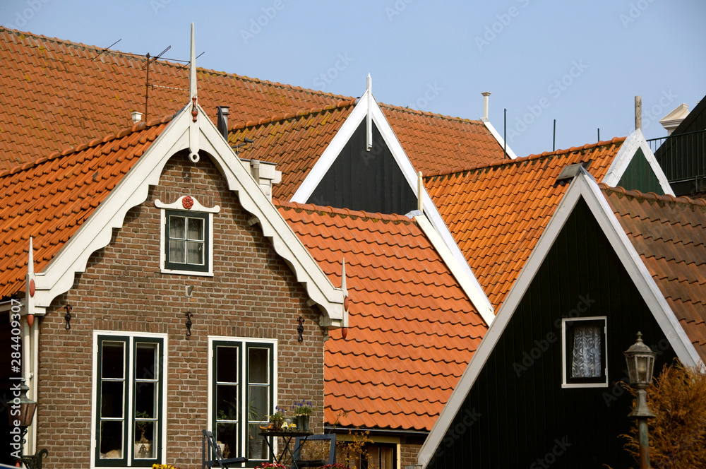The Netherlands (aka Holland), Volendam. Popular picturesque fishing village on the IJsselmeer. Typical Dutch architecture.