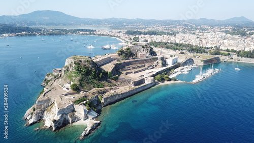 Aerial drone view of picturesque old town of Corfu island featuring iconic castle a UNESCO world heritage site, Ionian, Greece