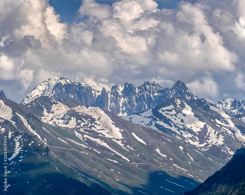 Summits of snow-capped Kackar Mountains at the beginning of summer time. Kackar Mountains is located in the Eastern Black Sea Region of Turkey. 