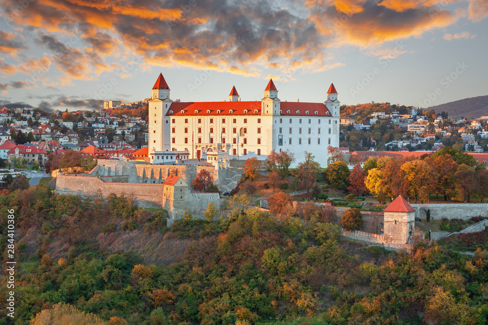 Bratislava castle over Danube river after sunset in the Bratislava old town, Slovakia