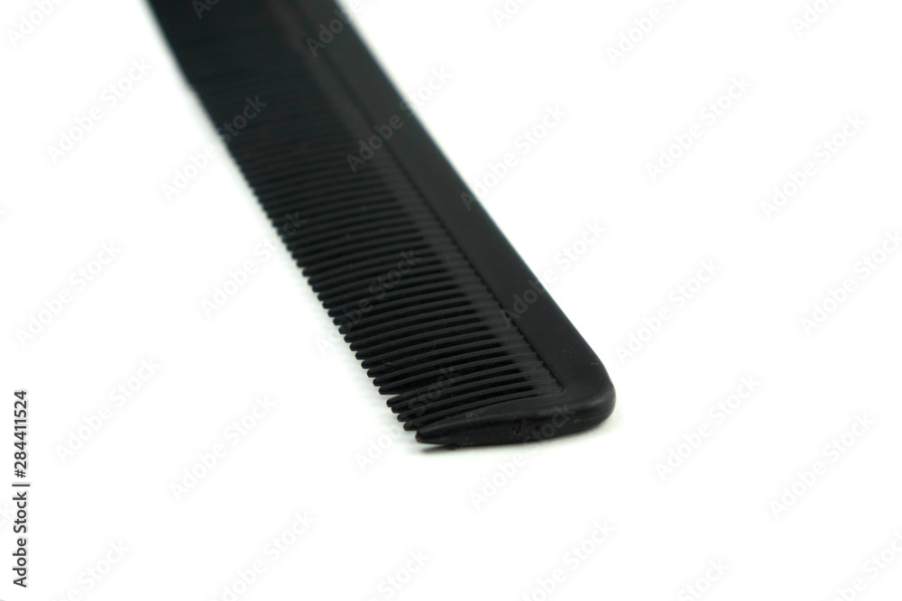 black hair comb isolated on white background. black hair comb isolated on white background.