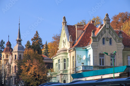 Romania, Brasov, Council Square, Piata Sfatului ornamental decorated buildings near square.